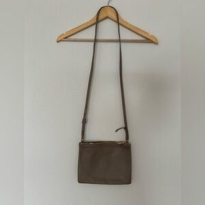Cuyana Crossbody Pouch in Stone. Made with Italian leather